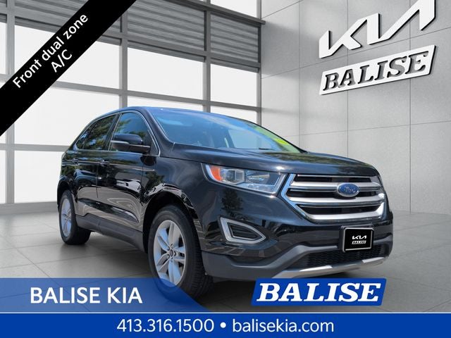 2018 Ford Edge SEL in Shadow Black — front three-quarter view