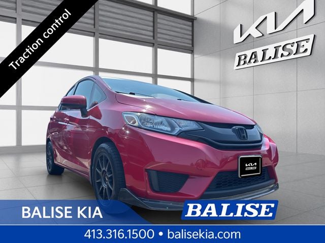2017 Honda Fit LX in Red — front three-quarter view