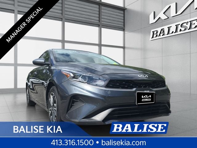 2024 Kia Forte LXS in Gravity Gray — front three-quarter view