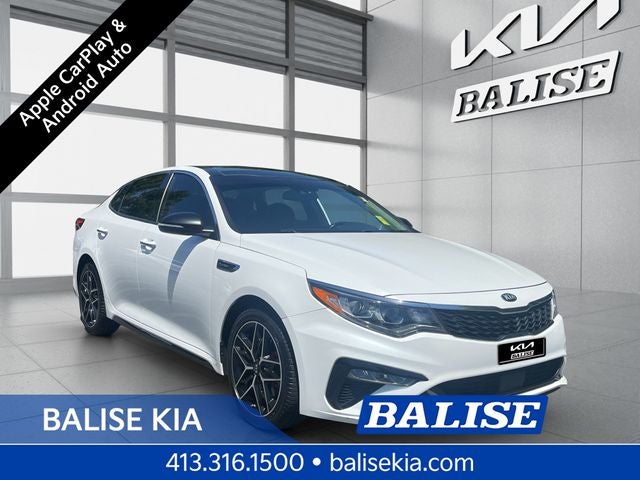 2019 Kia Optima SX Turbo in Snow White Pearl — front three-quarter view