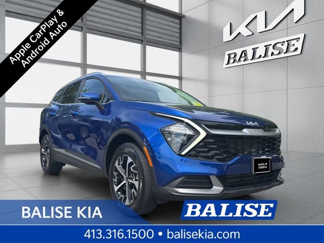 2023 Kia Sportage EX in Sapphire Blue — front three-quarter view