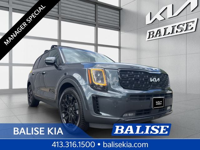 2022 Kia Telluride SX in Gravity Gray — front three-quarter view