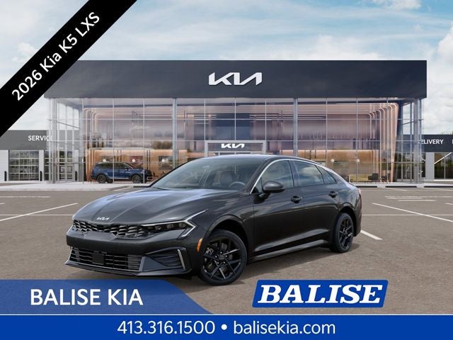 2026 Kia K5 LXS in Interstellar Gray — front three-quarter view